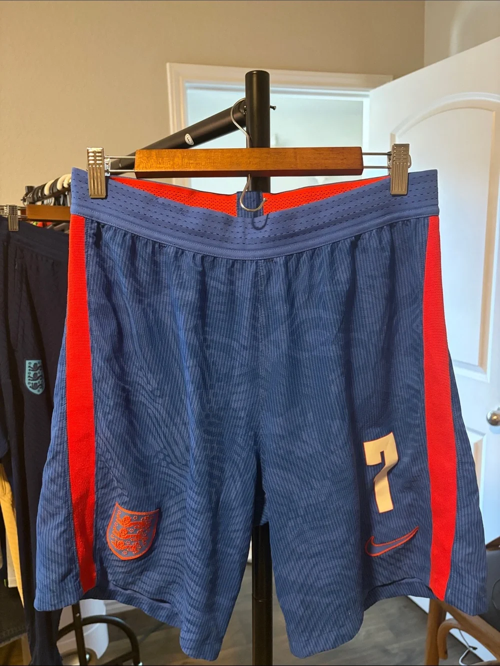 Nike Men's Blue and Red Athletic Shorts with Number 7